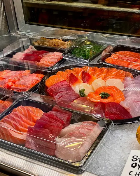 Salmon, tuna and kingfish in the fish market counter